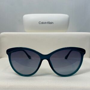 Calvin Klein CK19583 Turquoise Soft Cat Eye Sunglasses with Gradient Gray Lenses